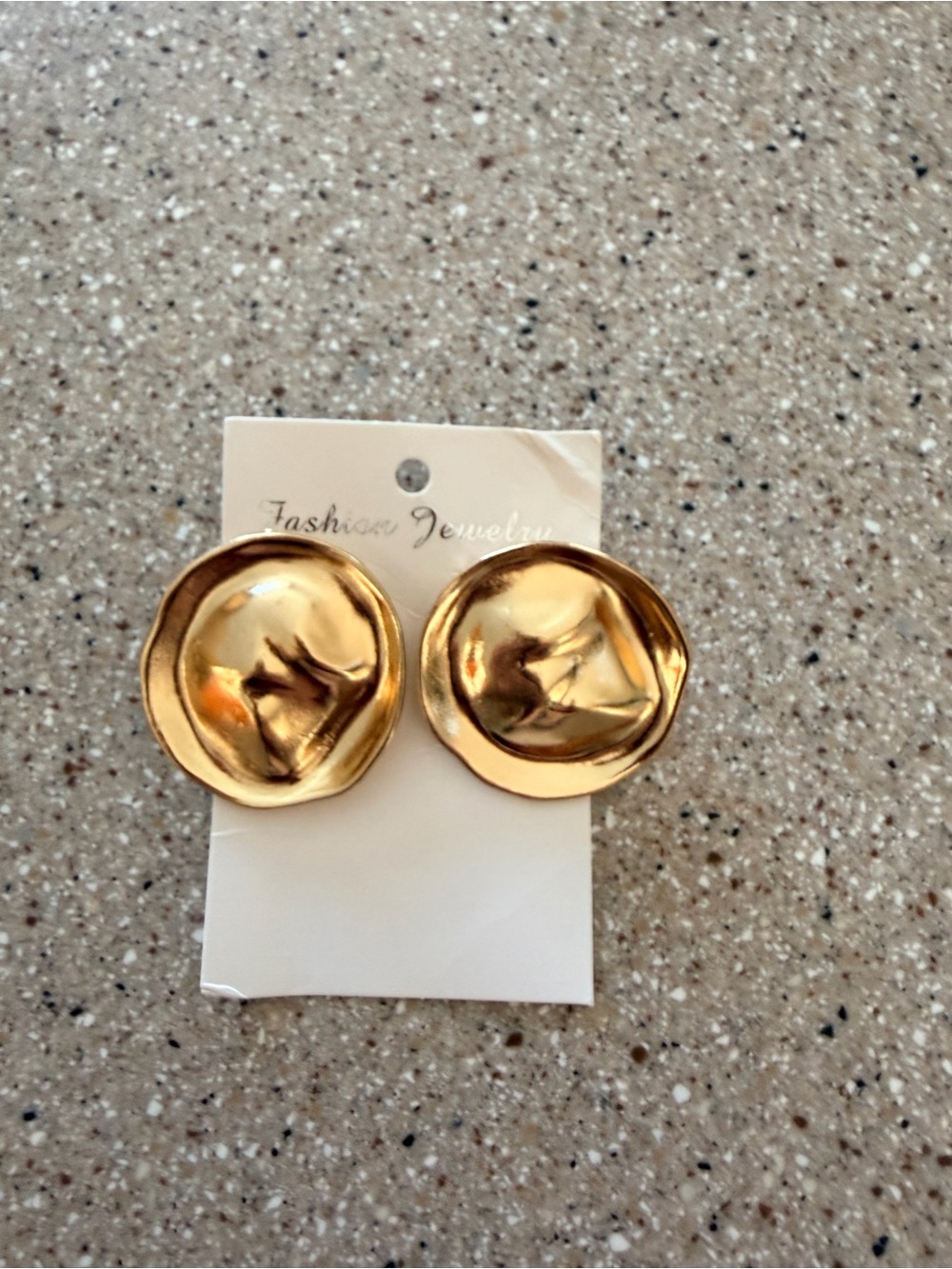 Round golden fashion earrings
